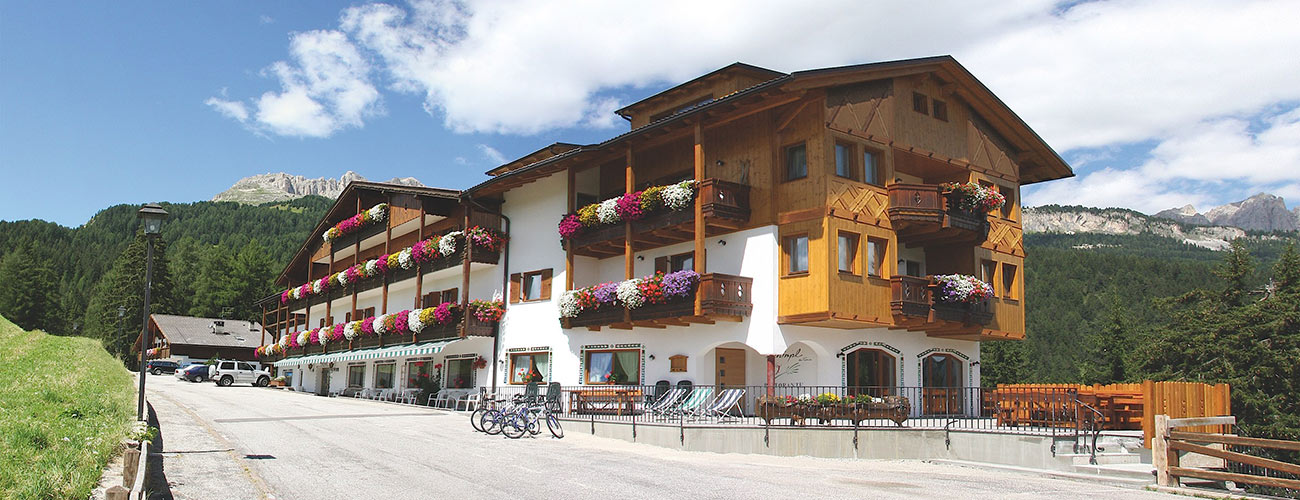 Outside view of the Hotel Gran Mugon in Fassa Valley